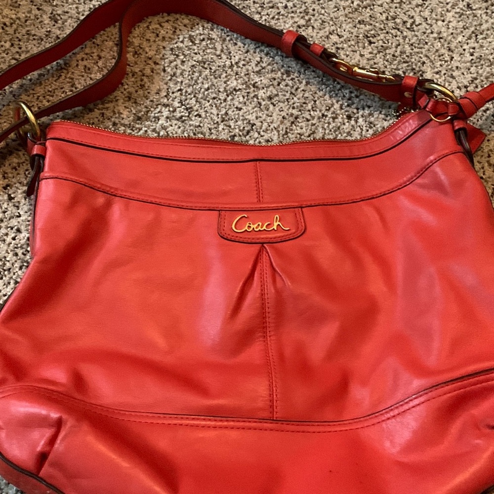 Coach handmade with signs of west but still a great bag. Smoke free home